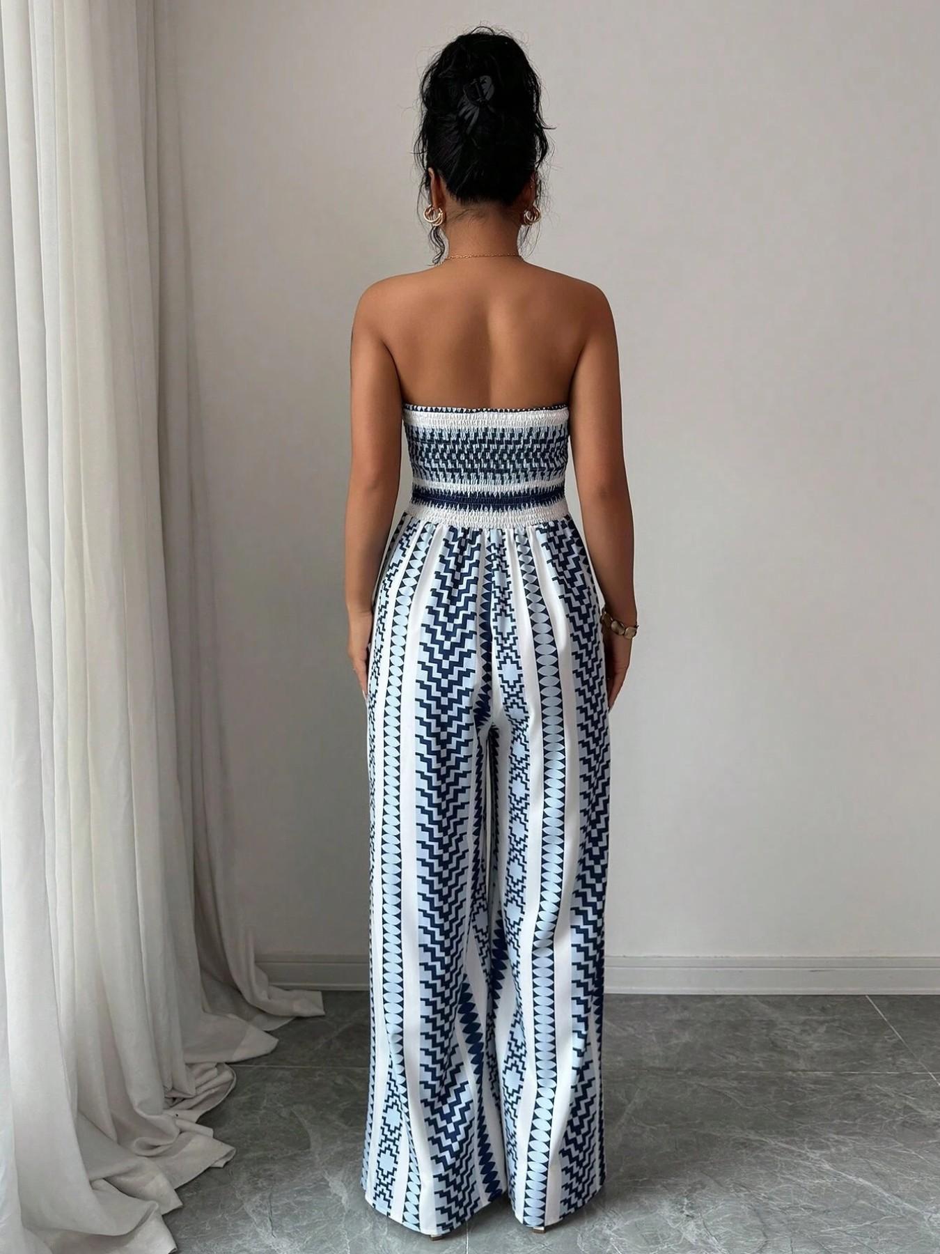 👗 50% RABATT NU! 💥 Geometrisk jumpsuit med halsringning & sidoslits – Unikt mönster & elastisk rygg – Mångsidig, perfekt för sommarfester eller semesterkläder ✨