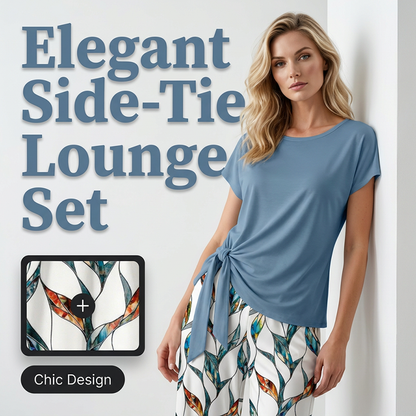 🌿👚👖 50 % RABATT på set med topp med knytband i sidan och mönstrade byxor för damer ✨ – Mjuk och andningsbar materialblandning, justerbar midja som framhäver figuren och botaniskt mönster