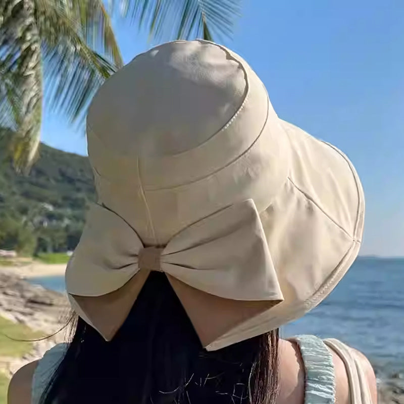 Dam solhatt med bred brätte & rosett 🌸 Söt rosett, fullt UV-skydd – sommarens vackraste accessoar ☀️