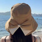 Dam solhatt med bred brätte & rosett 🌸 Söt rosett, fullt UV-skydd – sommarens vackraste accessoar ☀️