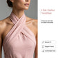 Elegant halterneck-overall utan ärmar med knytband i midjan